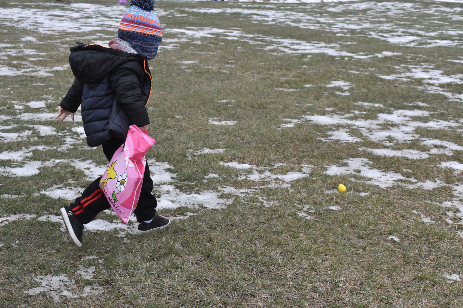 Aden Lain, 5, finds an egg